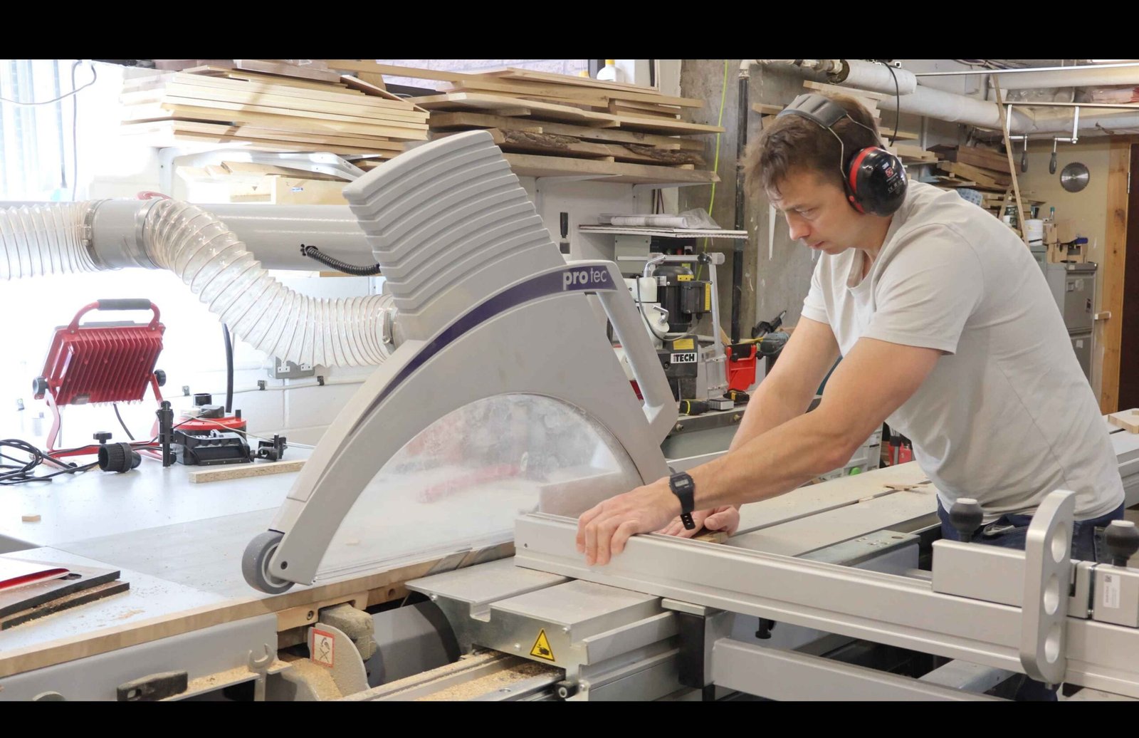 Jakub Szimpel handcrafting bespoke furniture in his Edinburgh workshop